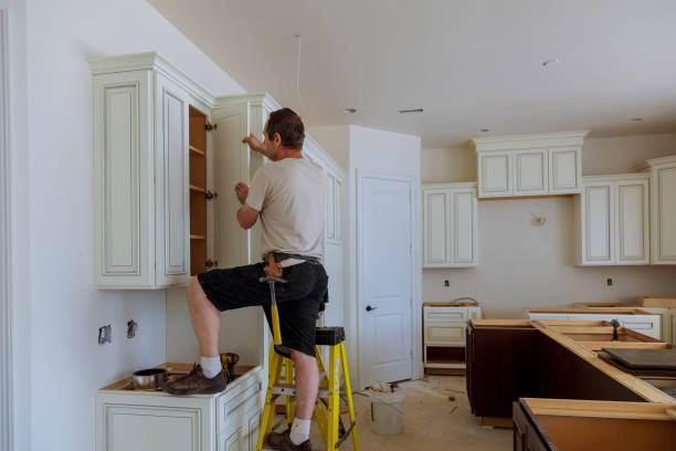 Open concept kitchen conversion in New Richmond by JMT Kitchen Cabinet